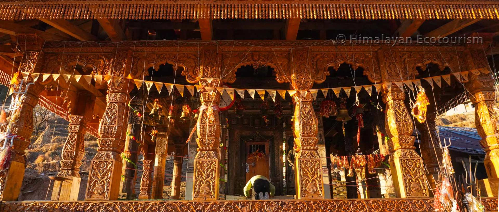 Someone praying at the Devi Kothi temple (Mandir) in the Devi Kothi temple, Churah valley